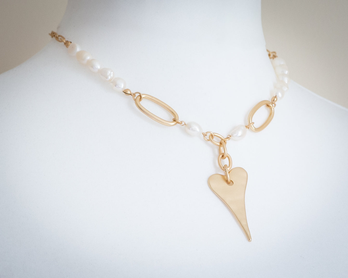 Gold and pearl heart necklace