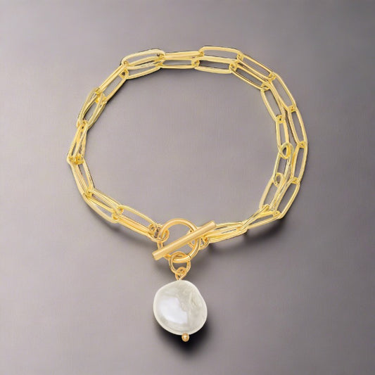 Gold pearl pendant bracelet